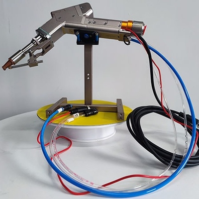 Un buon prezzo. Testa di saldatura laser a motore singolo a fibra manuale da 3000 W per strumenti di precisione in linea